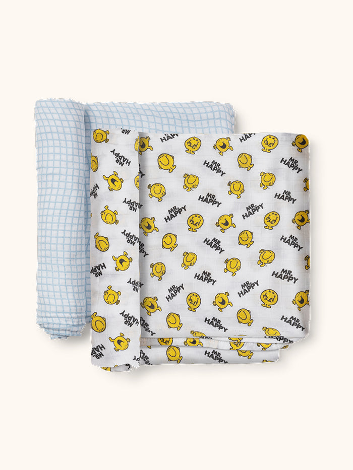 Mr. Happy Swaddle Blanket set of two with rolled up edges flat lay