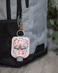 Floral Moth Hand-Sanitizer Holder with Travel Bottle